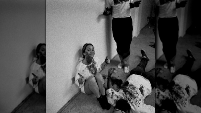 Francesca Xuereb smiling and giving a thumbs up for a horror scene.