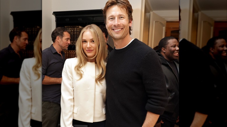 Michelle Randolph and Glen Powell together at a party