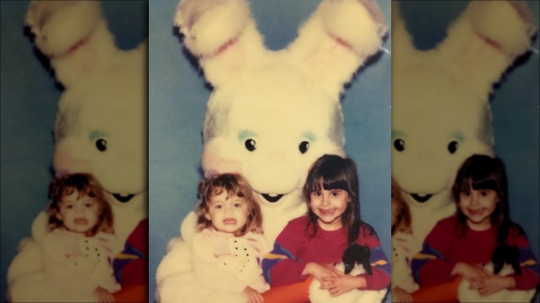 Lauren and Aja Hashian as kids with the Easter bunny