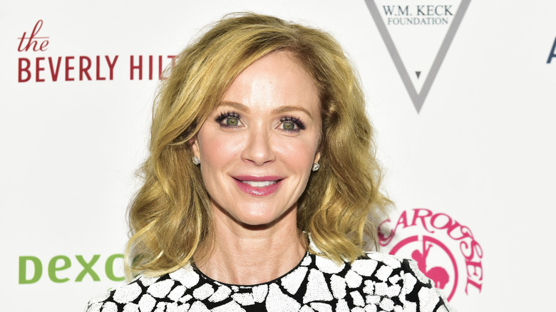 Lauren Holly posing on the red carpet
