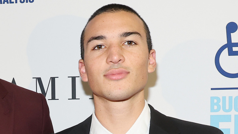 Nikko Gonzalez poses on the red carpet