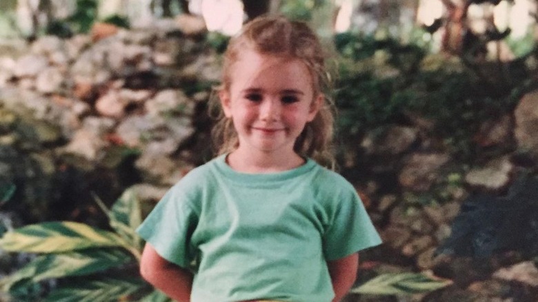 young Lily Collins smiling