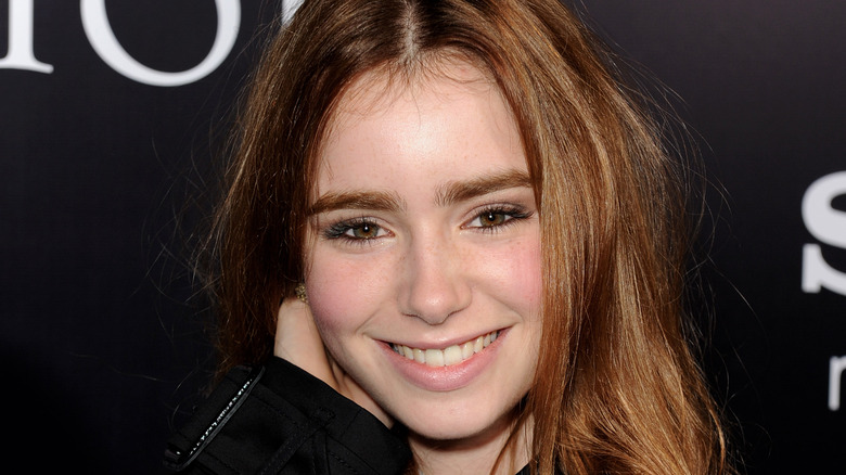 Lily Collins with red hair