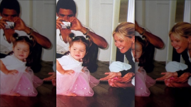 Mark Consuelos and Kelly Ripa with young Lola Consuelos
