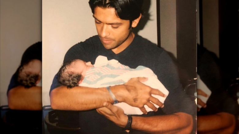 Mark Consuelos with baby Lola Consuelos in 2001