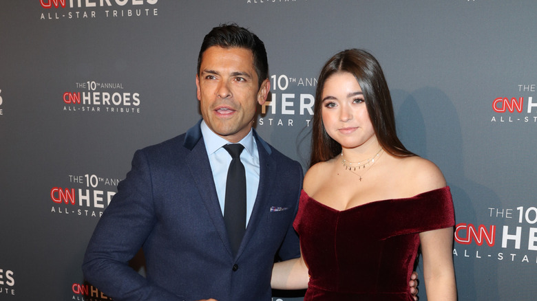 Mark Consuelos and Lola Consuelos posing at an event in 2016