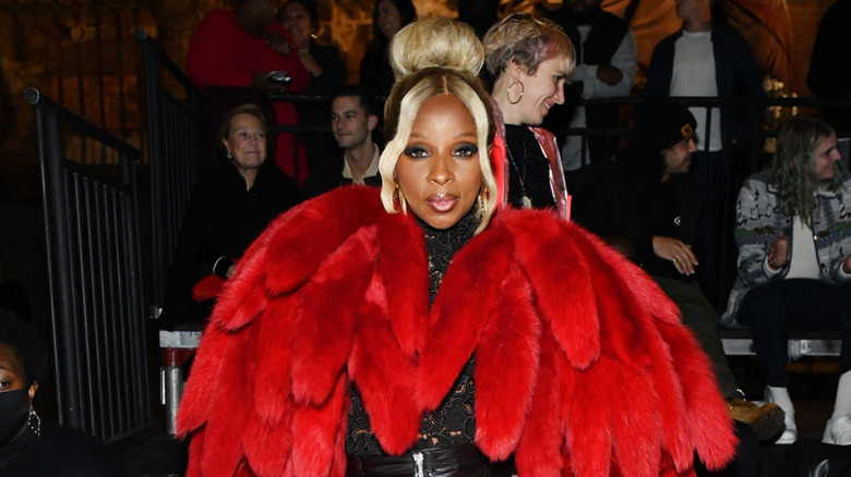 Mary J. Blige in a red coat
