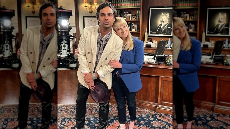 Melissa Rauch posing with her arm around Kunal Nayyar on the "Night Court" set