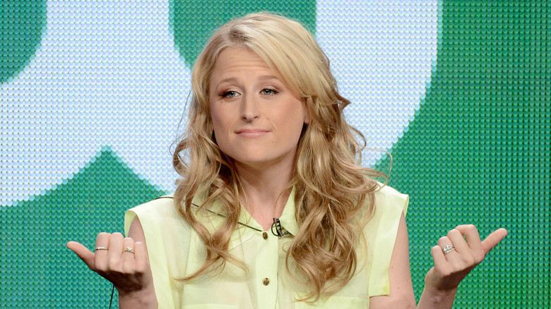 Mamie Gummer sitting on a panel