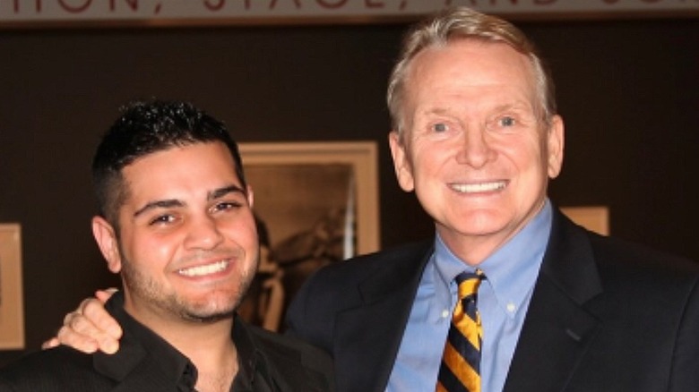 Michael Costello posing for a photo with Bob Mackie