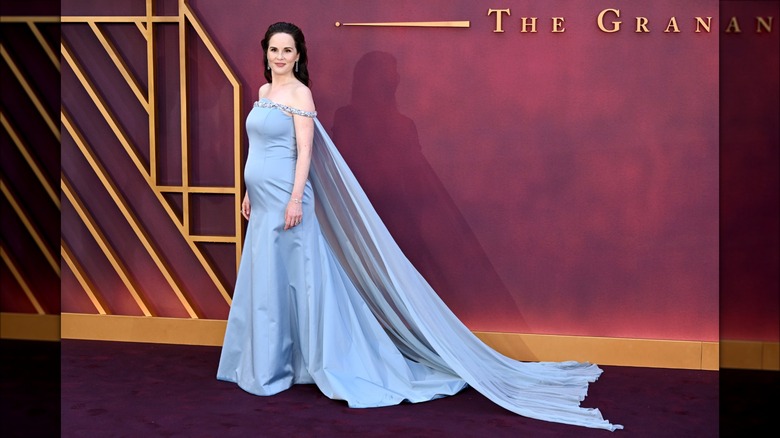 Michelle Dockery shows off her baby bump at the Downton Abbey film premiere