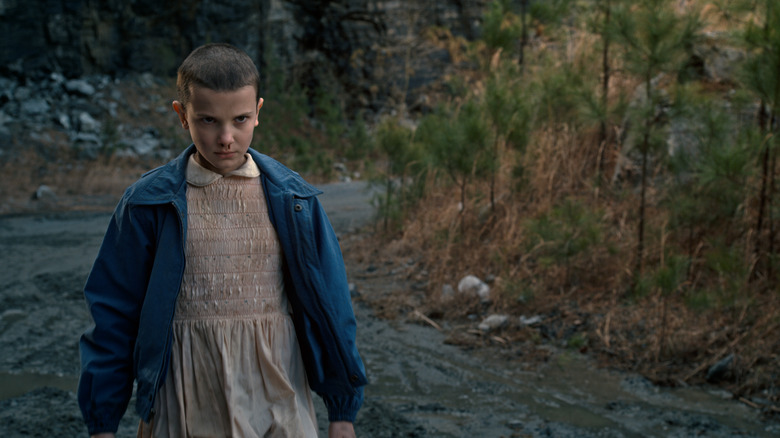Millie Bobby Brown portraying Eleven
