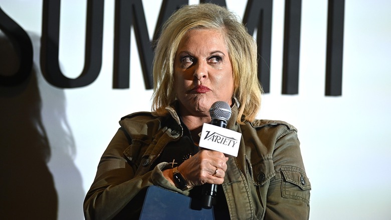 Nancy Grace holding a Variety microphone after leaving HLN