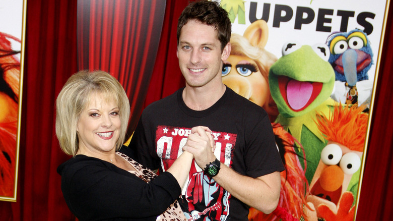 Nancy Grace and "Dancing With The Stars" partner Tristan McManus attending the 2011 "Muppets" premiere