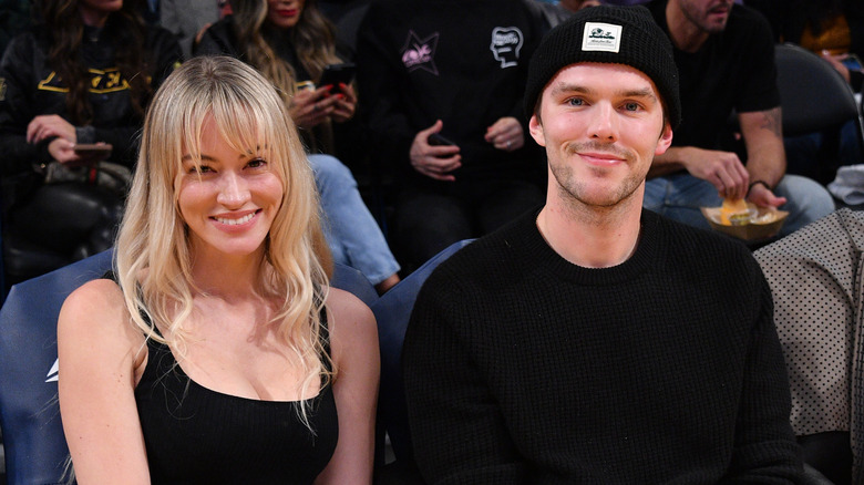 Bryana Holly and Nicholas Hoult at an NBA game in Los Angeles