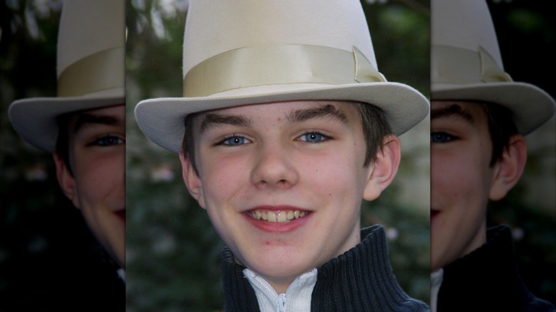 Nicholas Hoult wearing a hat for the charity Gingerbread