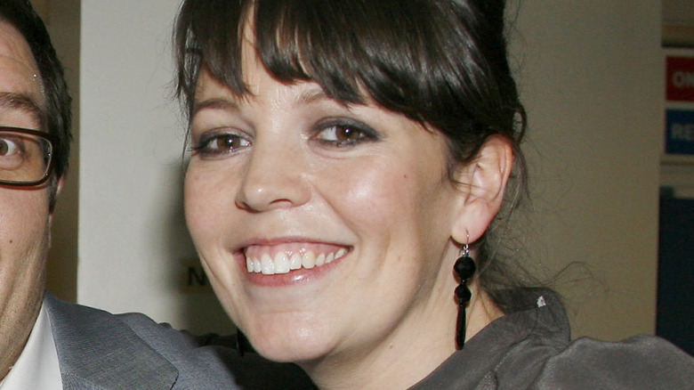 Olivia Colman smiling at an event in 2007