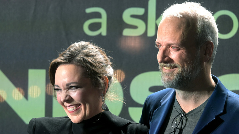 Olivia Colman and Ed Sinclair on the red carpet at the Landscapers premiere in 2021