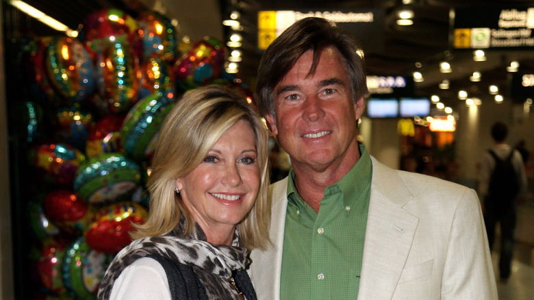 Olivia Newton-John with her husband