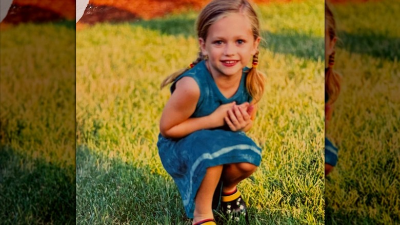 Maggie Sajak smiling as a child