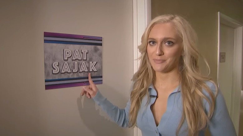 Maggie Sajak pointing to Pat Sajak's dressing room in 2021