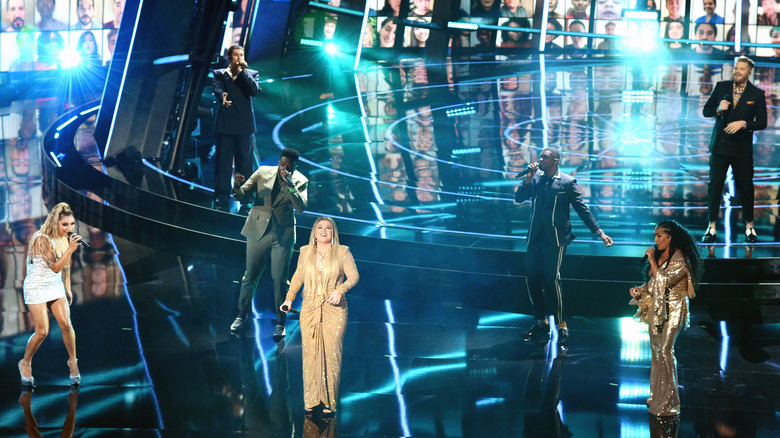 Pentatonix performing on stage with Kelly Clarkson