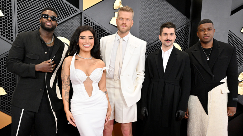 The members of Pentatonix posing on the red carpet at the Grammy Awards