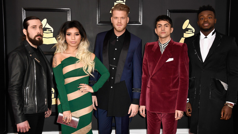 Pentatonix posing at the Grammys