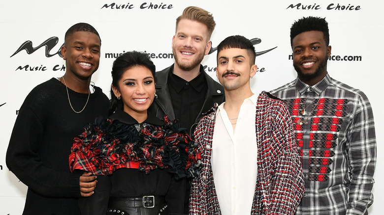 Pentatonix featuring Matt Sallee posing on step-and-repeat in 2017