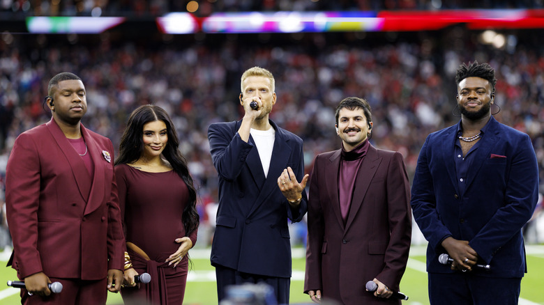 Pentatonix performing the national anthem at a sporting event