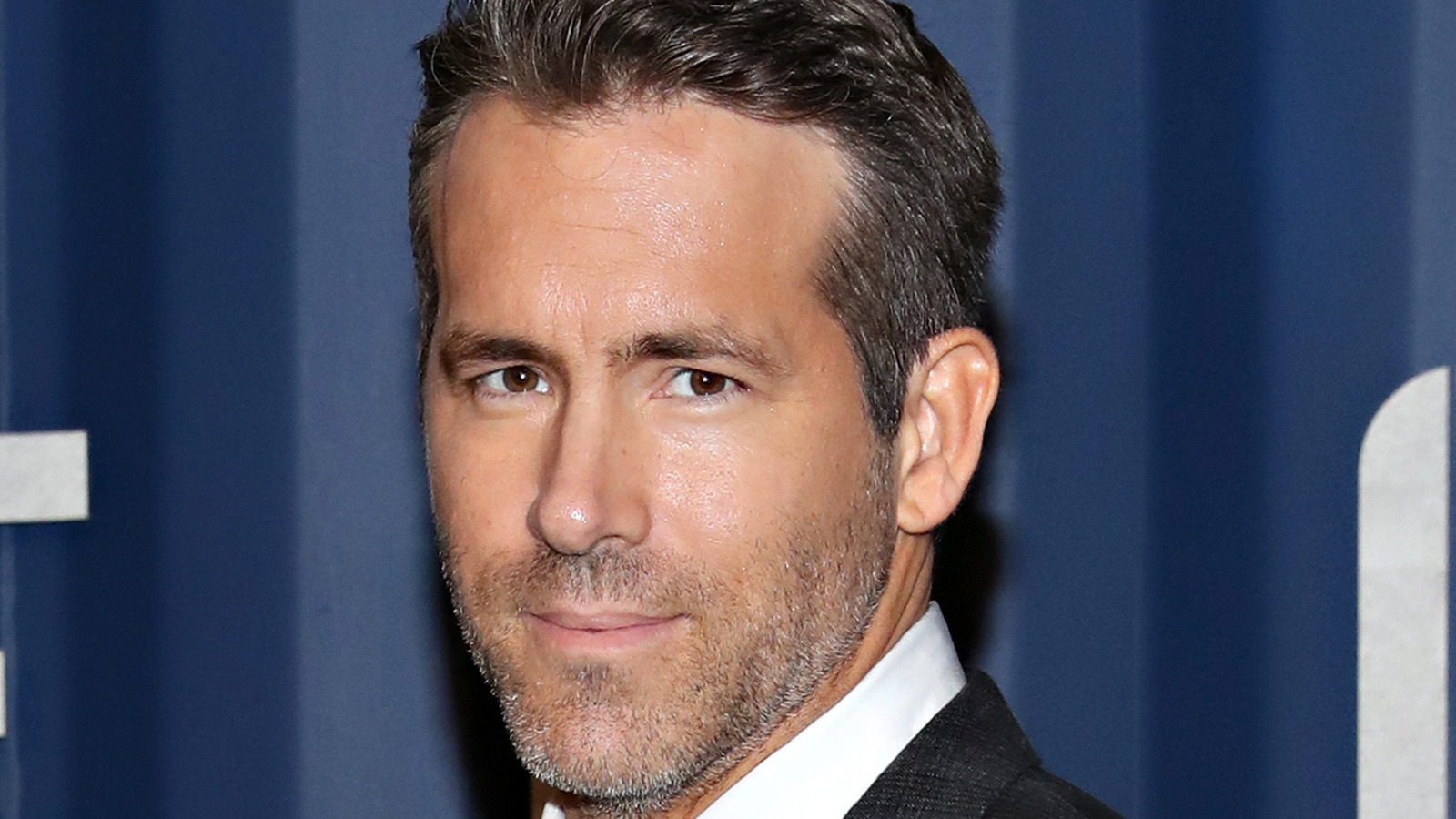 https://www.thelist.com/img/gallery/the-stunning-transformation-of-ryan-reynolds/l-intro-1621460913.jpg