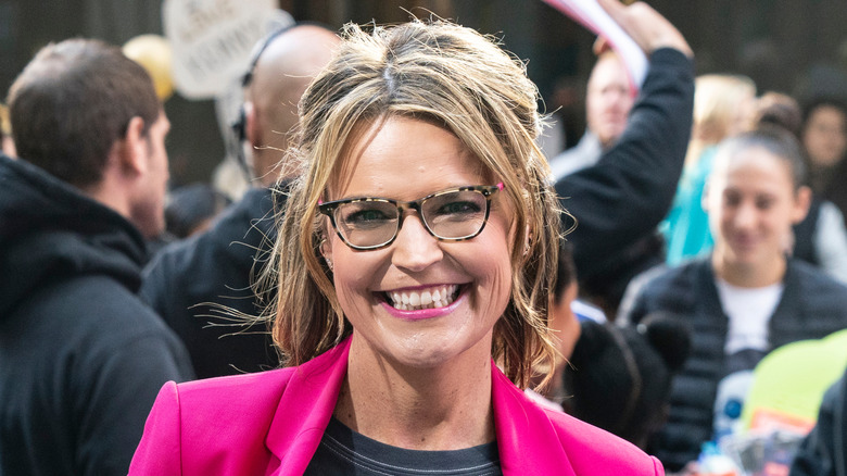 Savannah Guthrie smiling in glasses
