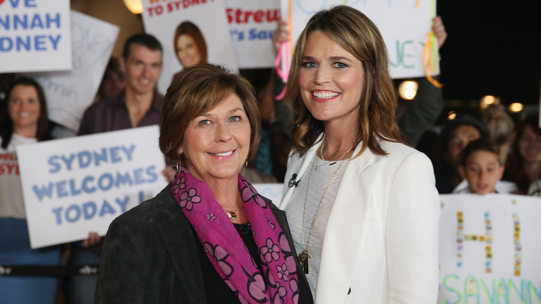 Nancy and Savannah Guthrie smiling un front of fans