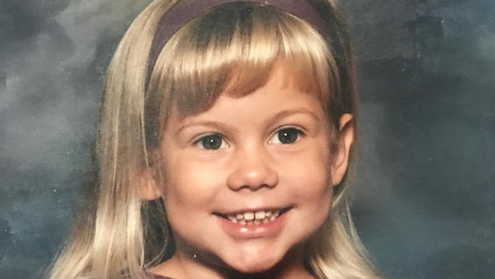 Young Shawn Johnson smiling
