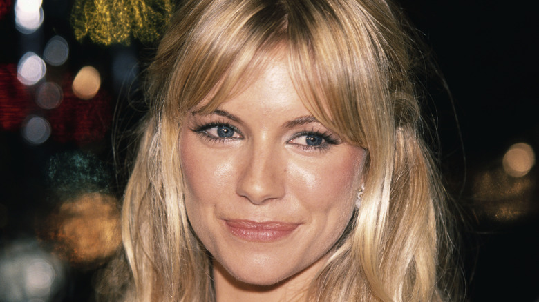 Young Sienna Miller with bangs
