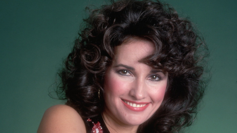 Susan Lucci smiling and posing in the 1980s