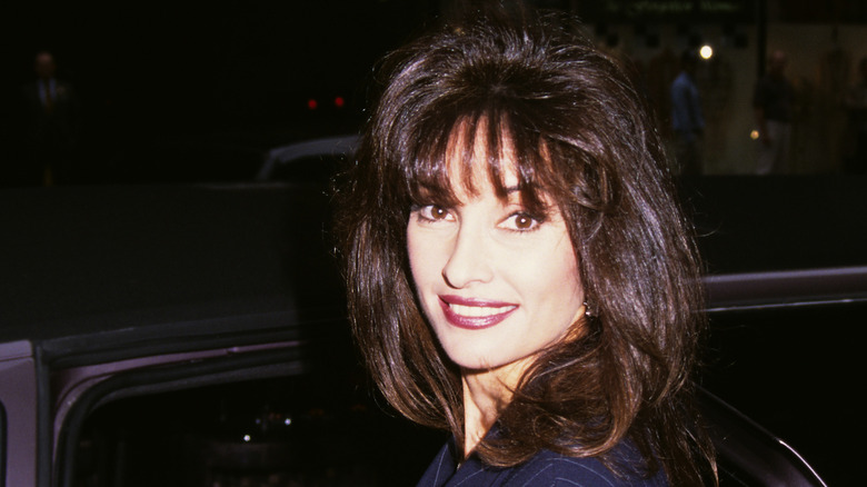 Susan Lucci photographed outside an automobile
