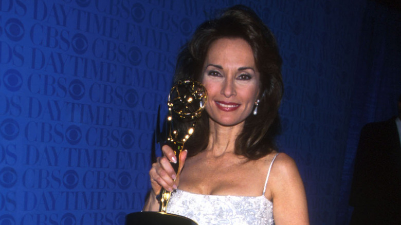 Susan Lucci holding her Emmy after her first win in 1999