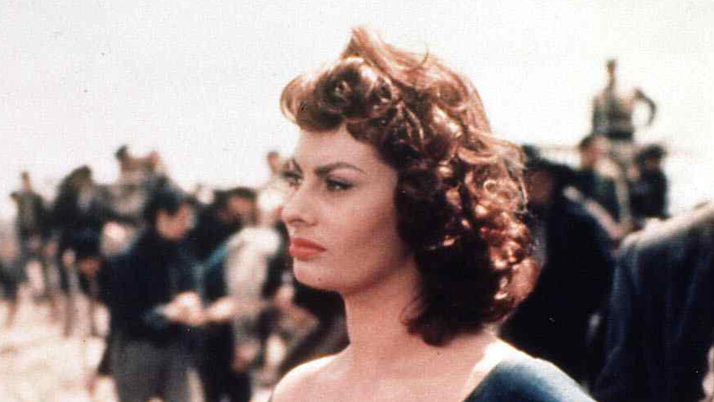 Sophia Loren in an archival movie photo, in a battle scene