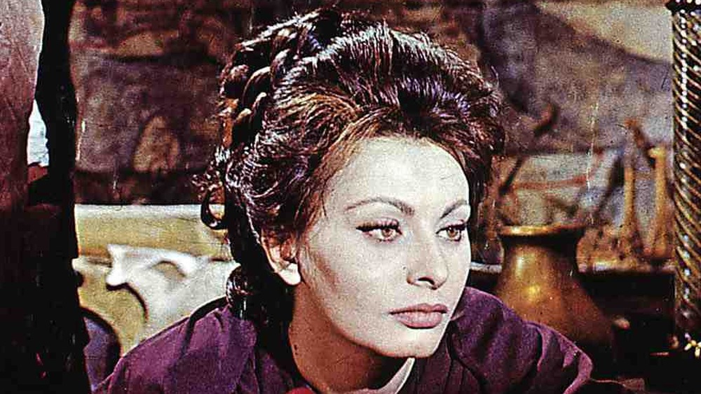 Sophia Loren in an archival movie photo, looking down
