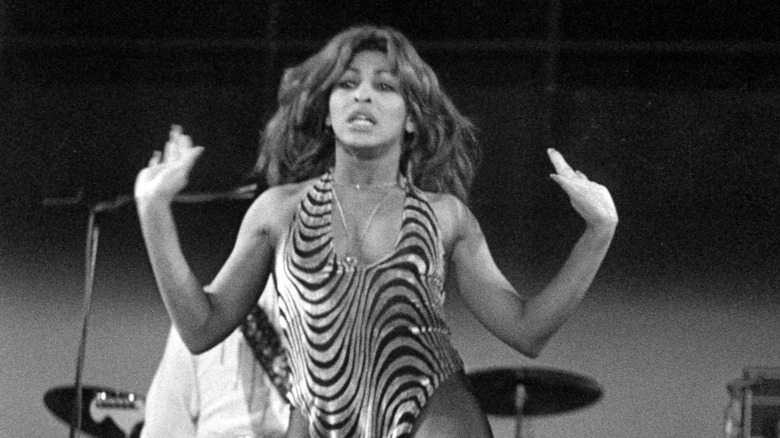 Tina Turner performing on stage