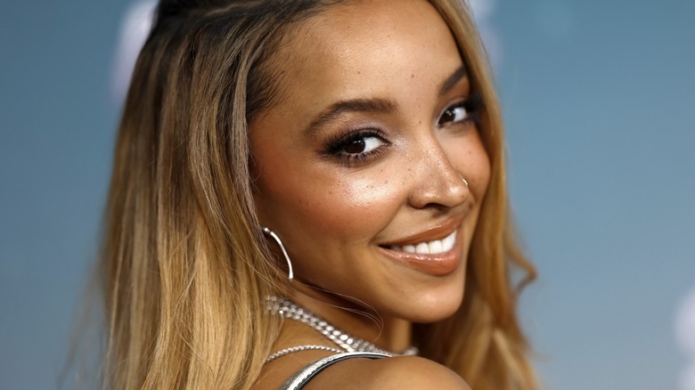 Tinashe looking over her shoulder smiling