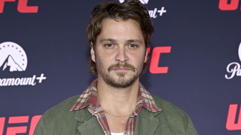 Luke Grimes shoulders-up at a red carpet event in 2026