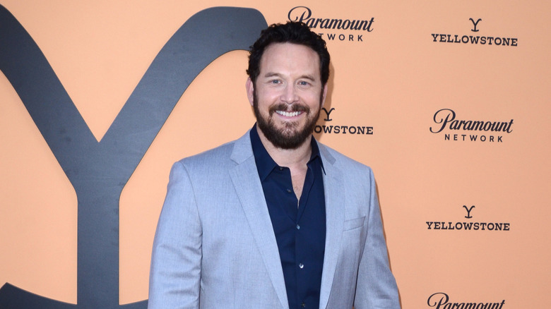 Cole Hauser posing on step-and-repeat