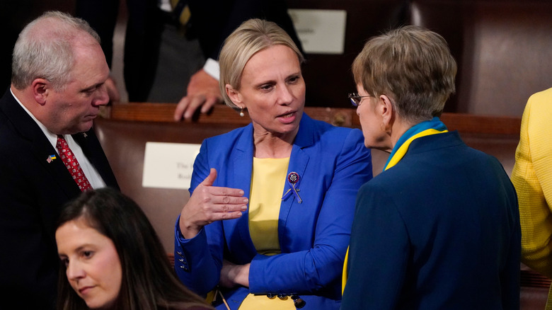 Lawmakers wear blue and yellow to State of the Union address