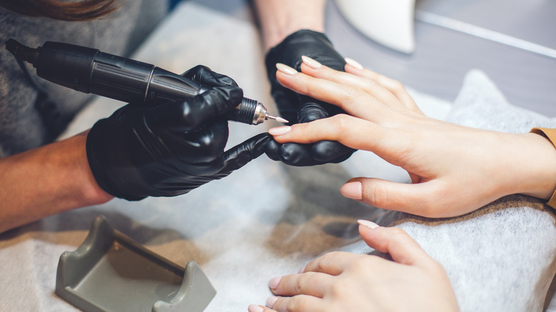 Woman getting a manicure