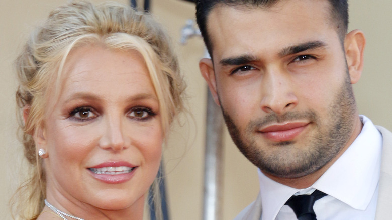 Britney Spears and Sam Asghari smiling