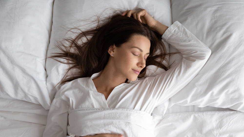 Woman sleeping alone