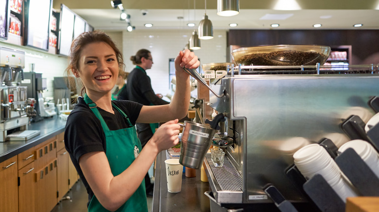 Starbucks barista making coffee