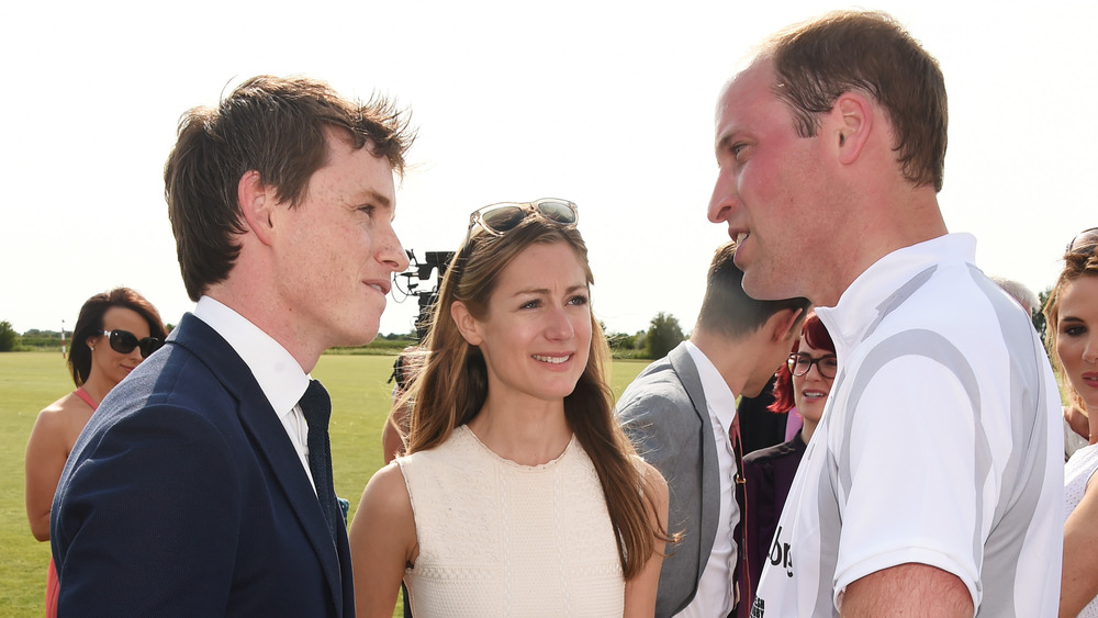 Eddie Redmayne talking with Prince Willaim